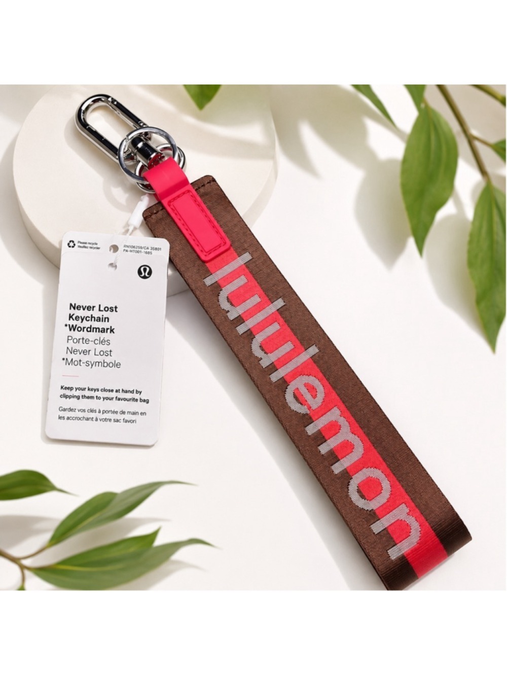 Lululemon Never Lost Keychain Wordmark Pink Brown NWT
